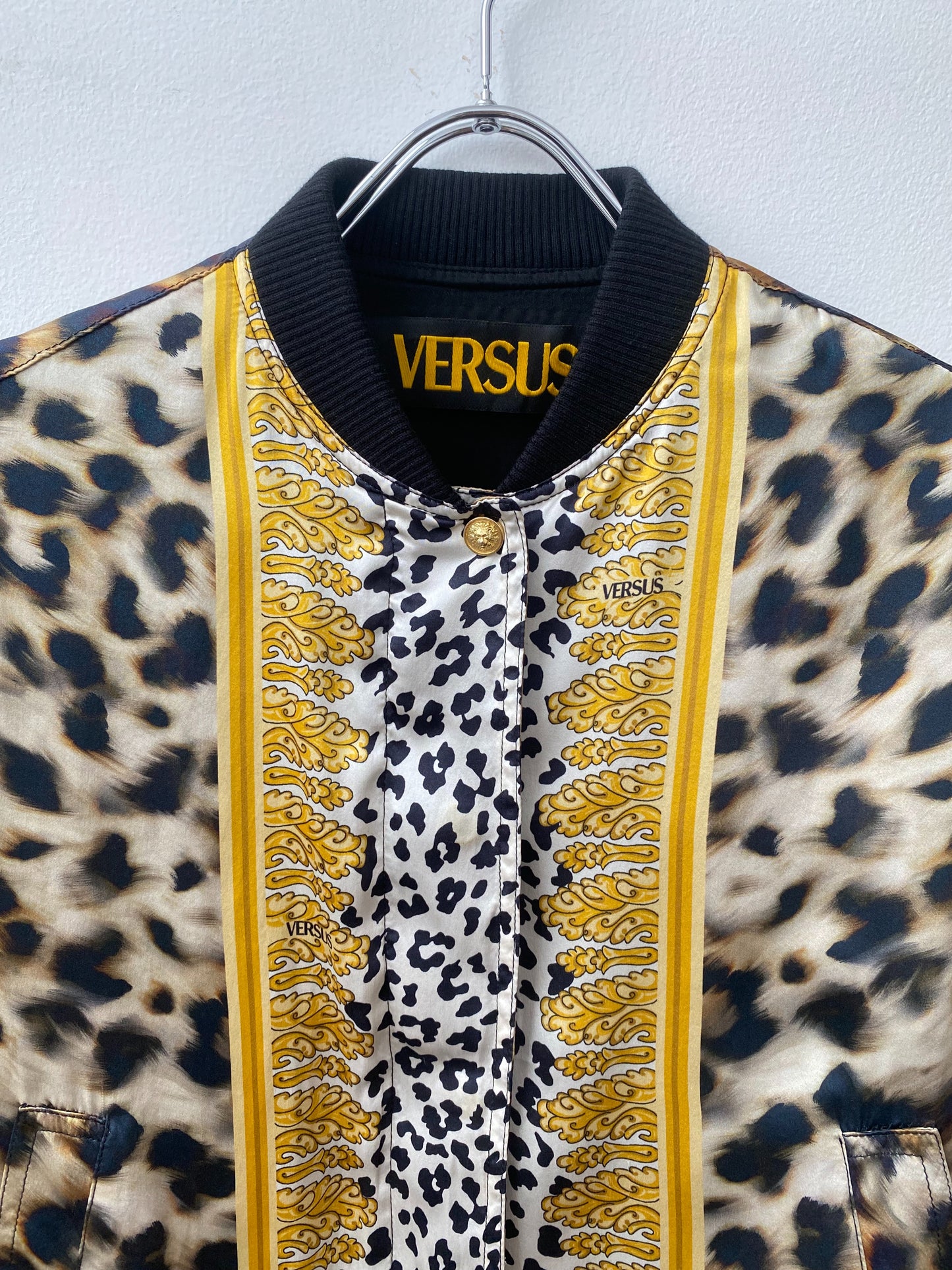 Versus Versace — Leopard Skin Silk Bomber Jacket.