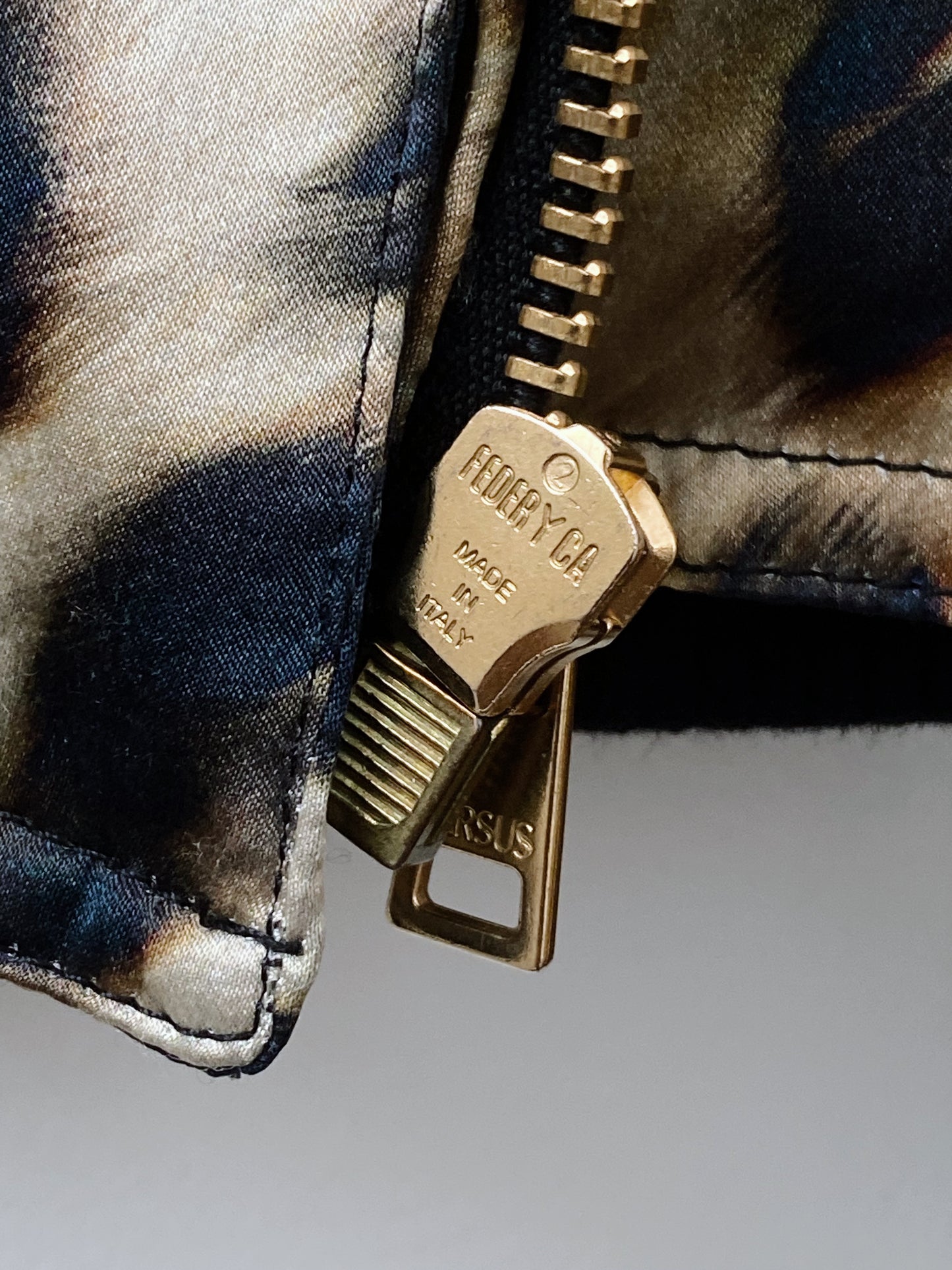 Versus Versace — Leopard Skin Silk Bomber Jacket.