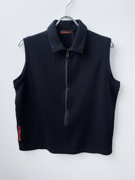 Prada — Sleeveless Polo Zip Top.