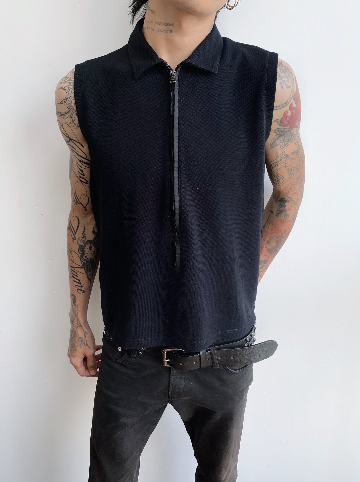 Prada — Sleeveless Polo Zip Top.