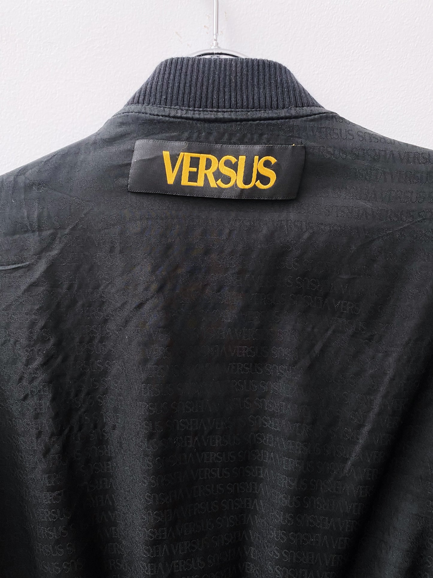 Versus Versace — Leopard Skin Silk Bomber Jacket.